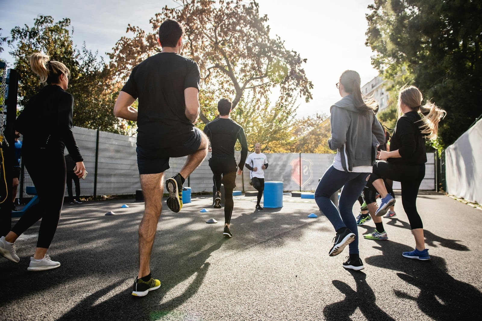 Person stretching outdoors for overall wellness