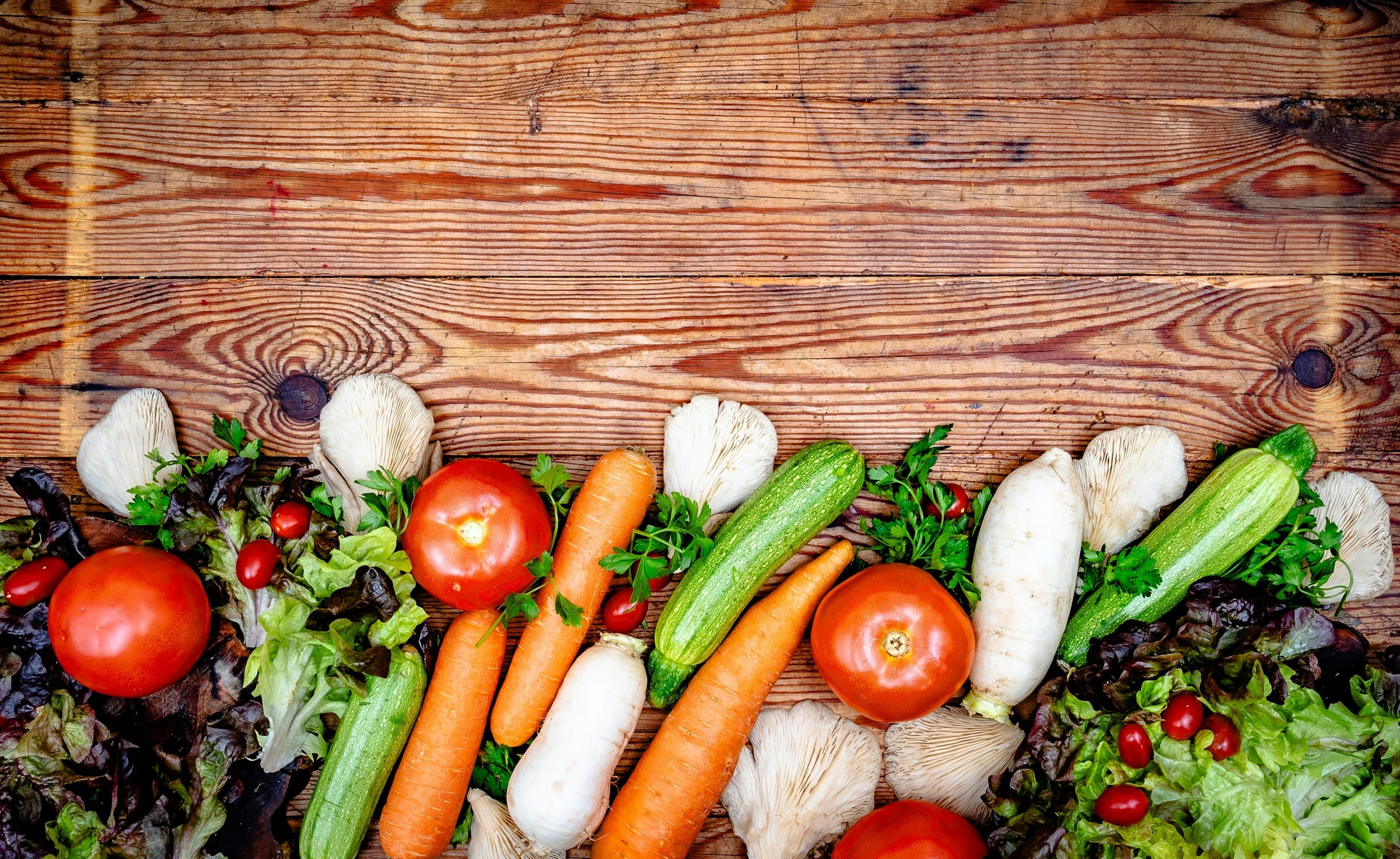 A vibrant arrangement of fresh whole vegetables, reflecting the nutrient-dense food choices that help reduce inflammation and support nervous-system health.